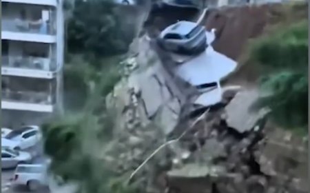 ვიდეოში ჩანს, როგორ ჩამოიშალა საცხოვრებელ ზონაში მიწის მასა და დაპარკინგებული ავტომობილები მოიყოლა - ვრცელდება ძალიან მძიმე კადრები ( ვიდეო )